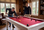 Two men playing pool on the white Heemskerk Richmond with burgundy cloth in a games room