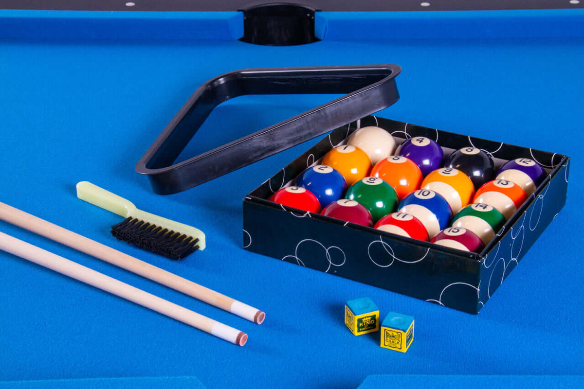 Pool cues, triangle, ball set, chalk and brush included with the Heemskerk Solid Feet pool table