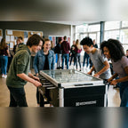 Students playing on a Heemskerk High TacTic Cover football table in a school