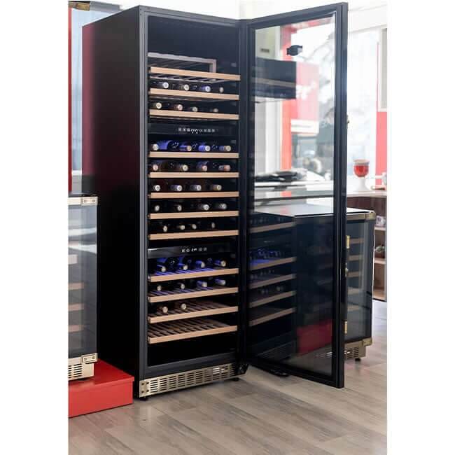 Kaiser Art Deco 3 zone wine cooler with the door open in a showroom, filled with wine bottles