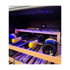 Wine bottles on a wooden shelf inside a Kaiser wine cooler with blue LED lighting