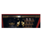 Close-up of the gold handles and fittings on a Kaiser Art Deco beer and wine cooler