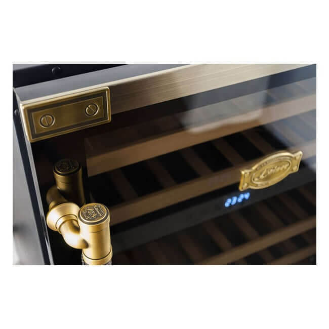 Close-up of the antique gold handle fitting and Kaiser badge on the Art Deco wine fridge