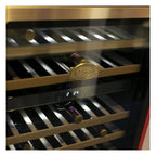 Wine bottles on wooden shelves behind the glass door of a Kaiser Art Deco wine fridge