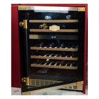 Kaiser Art Deco wine fridge with leather handle and gold kick plate, filled with bottles