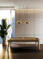 Beige leather Luxury Dandy pool table under brass pendant lights