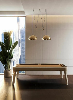 Beige leather Luxury Dandy pool table under brass pendant lights