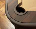 Close-up of a leather-lined pocket and ebony makassar top rail on the Luxury Dandy