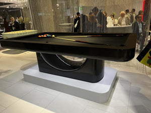 Luxury Mono pool table in a black carbon-fibre-effect finish with a sculptural central base