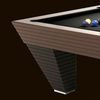 Close-up of the tilted ribbed leg and metal foot on the Luxury Newde