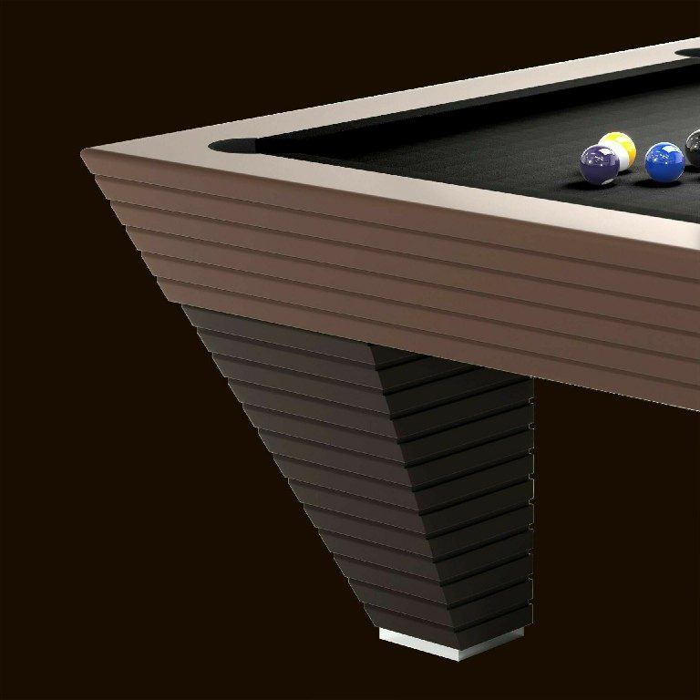 Close-up of the tilted ribbed leg and metal foot on the Luxury Newde