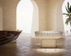 Luxury Oskar football table in cream lacquer in a room with arched walls