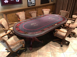 Luxury oval poker table with custom printed red and black cloth, hardwood racetrack and claw-foot pedestals