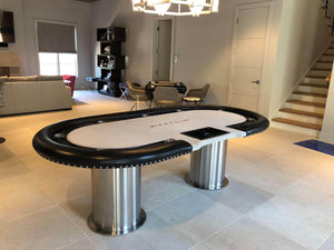 Luxury oval poker table with white cloth, dealer cut-out and chip tray, black leather rail and two steel pedestals