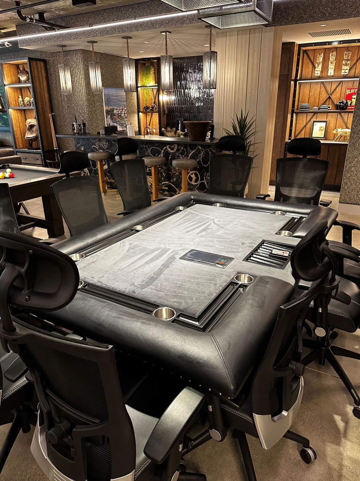 Luxury rectangular poker table with grey cloth, black leather rail, steel cupholders and built-in card shuffler, seating 8 to 10 players