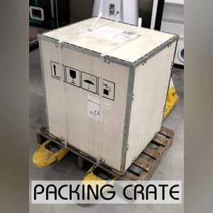Bartop arcade machine in its wooden packing crate