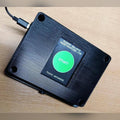 MadeForArcade buzz wire control unit with a green touchscreen start button