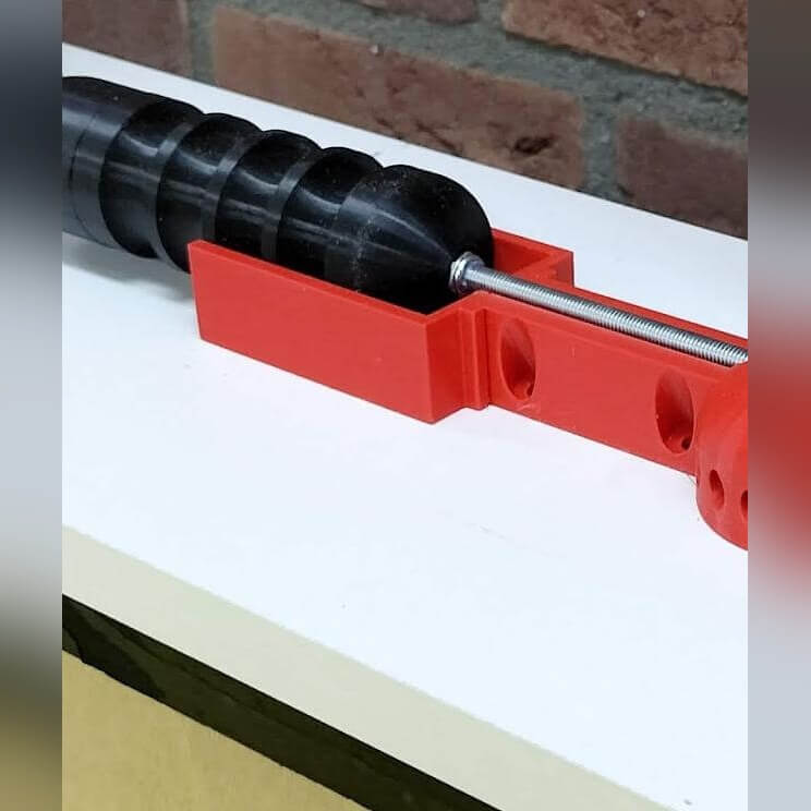 Close-up of the red wand holder on the Buzzer Balance Pro