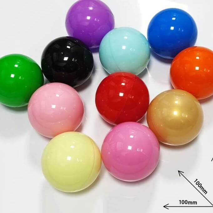 Coloured 100mm round capsules in assorted shiny colours