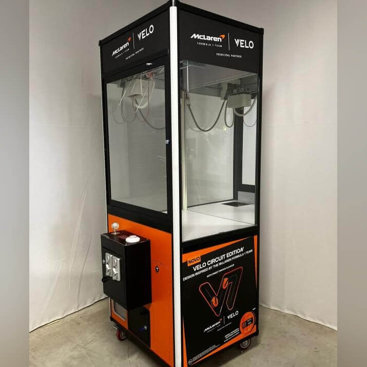 Black and orange cooled claw machine