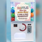 Counter-top gashapon machine with a raffle poster in its lightbox