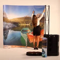 Curved backdrop wall with printed lake artwork