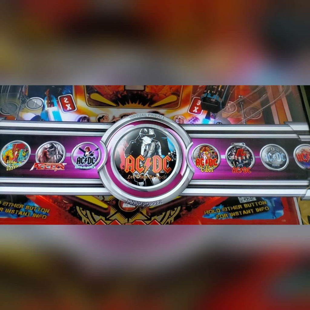 Close-up of the decorated front panel on a Flippatastic virtual pinball machine
