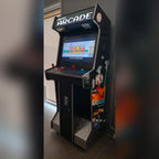 Full-size arcade machine with classic decals