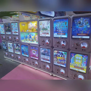 Wall of GashaGold gashapon machines with display windows
