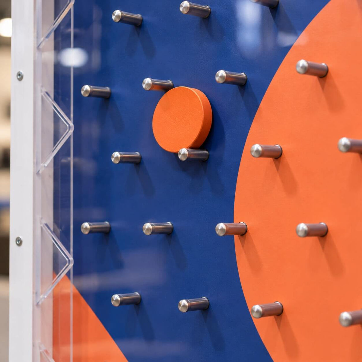 Close-up of the Plinko pegs and puck