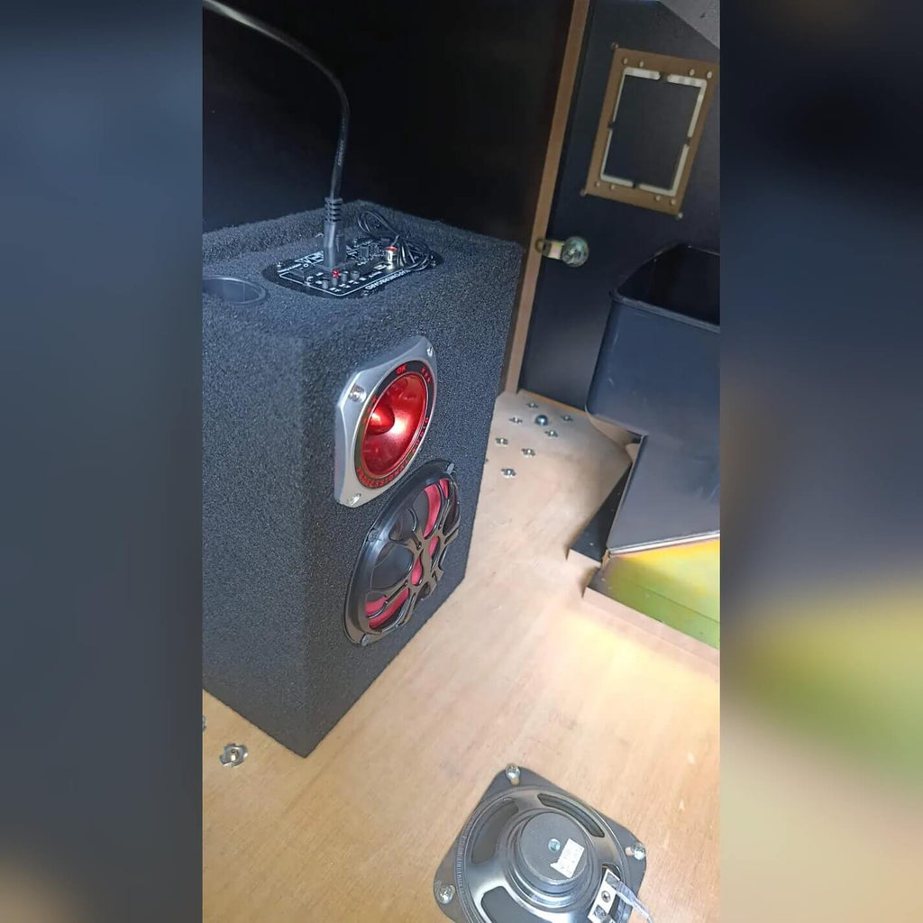 Inside the coin pusher cabinet