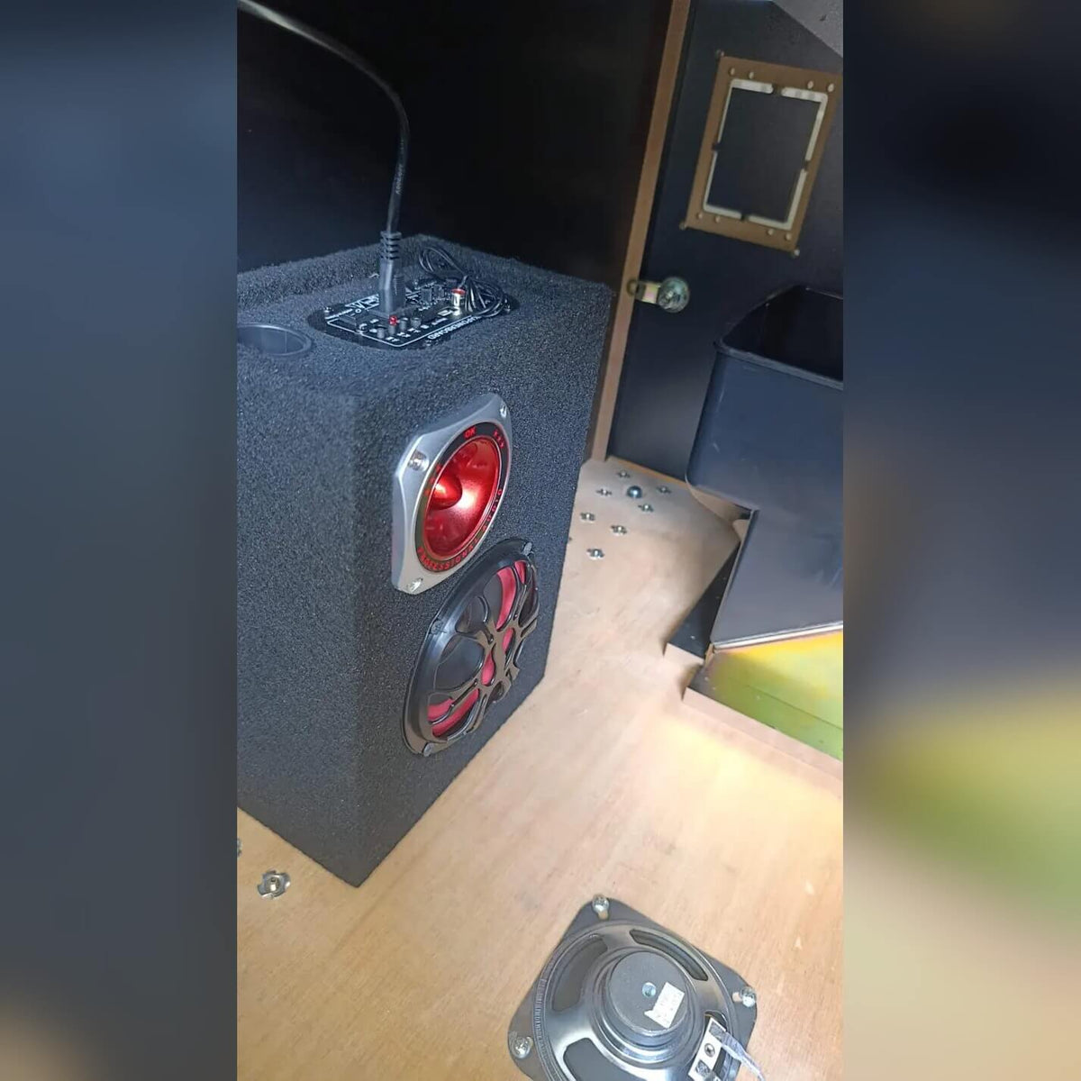Inside the coin pusher cabinet