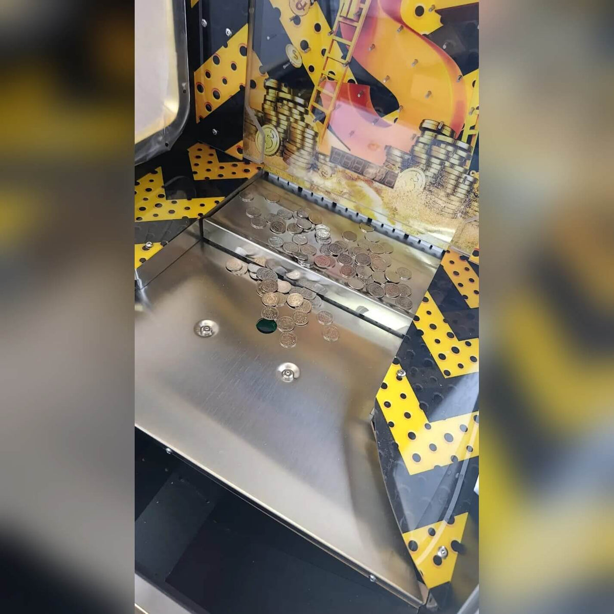 Row of Gold Digger coin pushers side by side