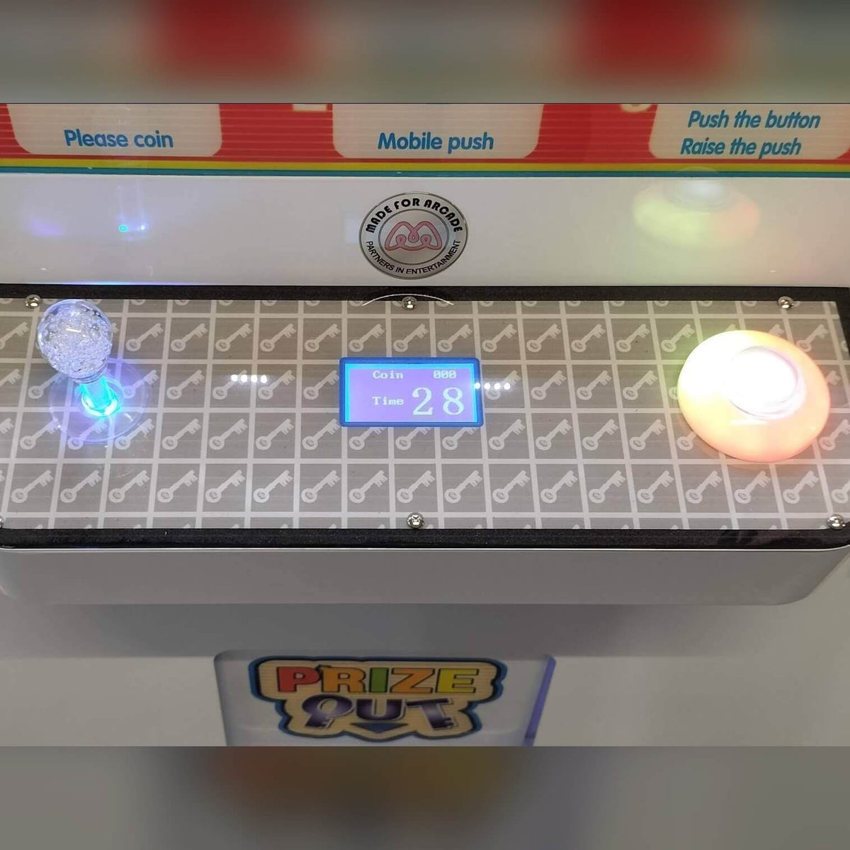 Coin and button panel on the Key Master prize game