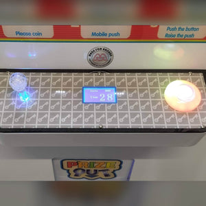 Coin and button panel on the Key Master prize game
