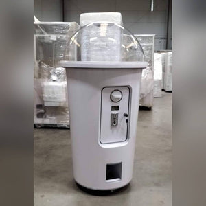 Side view of the white MadeForArcade milkshake cup capsule machine