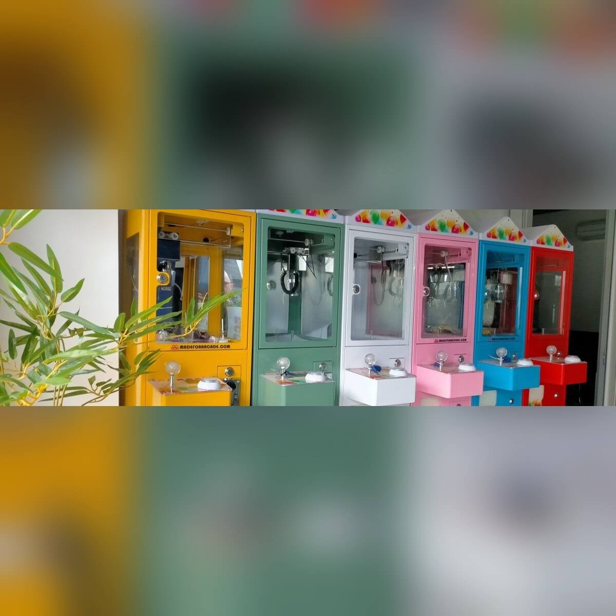 Mini claw machines in several colours