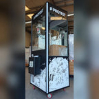 Personalised claw machine with a dark wrap