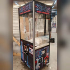 Personalised claw machine with a dark wood-effect wrap