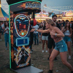 A woman punching the MadeForArcade Pro Boxing Machine at an event