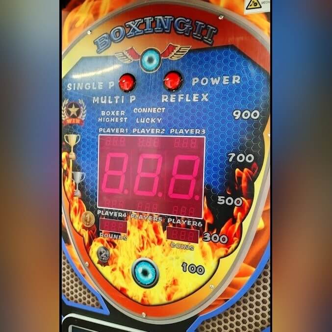 Pro Boxing Machine score display showing power and reflex modes