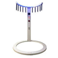 White MadeForArcade Reaction Ring with ten sticks hanging from the ring, on a white background