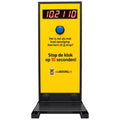Yellow MadeForArcade Stop the Clock totem with a red button and a digital timer