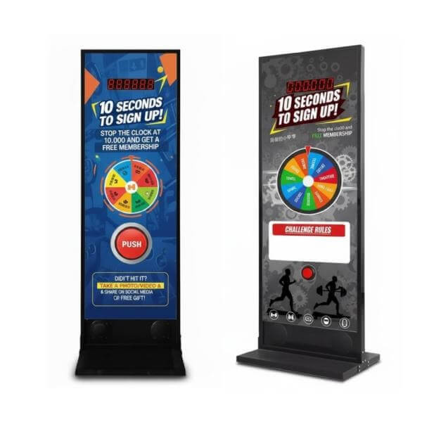 Two Stop the Clock totems with colourful prize wheel artwork