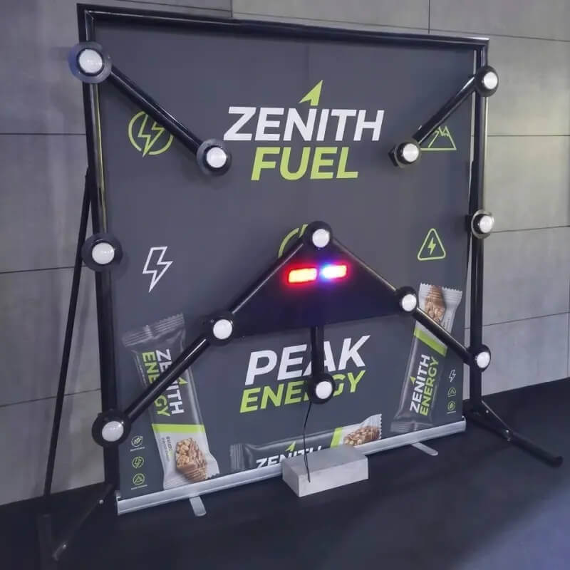 Strike-a-Light batak machine with a branded energy drink backdrop