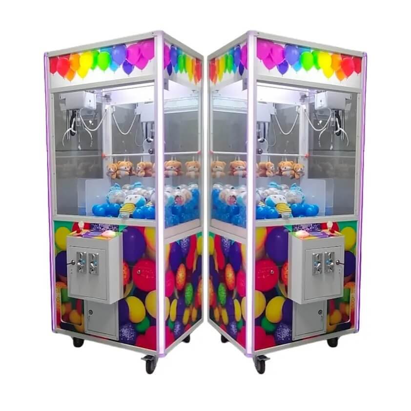Ball and balloon claw machine filled with coloured balls
