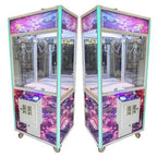 Two MadeForArcade themed claw machines with colourful artwork