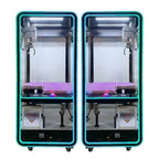 Two transparent black claw machines with blue neon edges