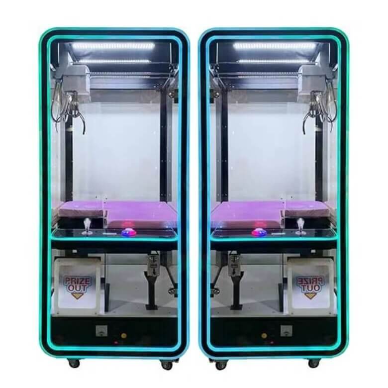 Two transparent black claw machines with blue neon edges