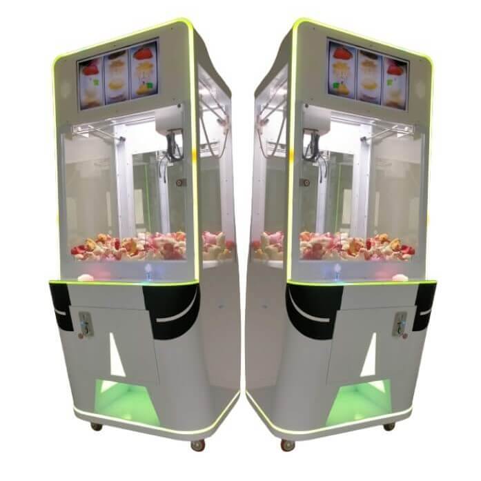 Two white video screen claw machines
